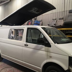 white camper van preparing for conversion