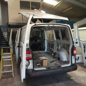 white camper van preparing for conversion