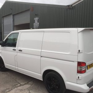 white vw van with black detailing