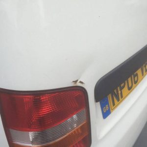 rust damage on white vw camper