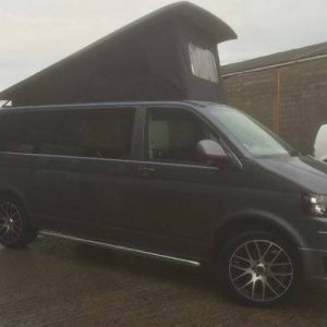 grey camper van with roof bed