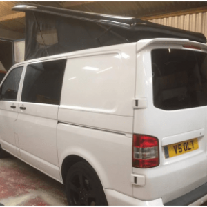 white and black vw camper van